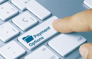 klawiatura komputerowa z klawiszem podpisanym Payment Options